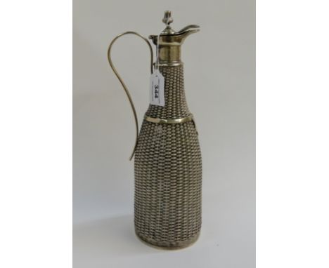 A white metal mesh overlaid claret jug Condition Report: It is 32cm. high to the top of the cover finial. .
