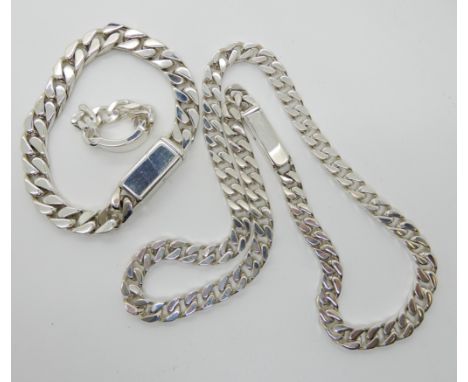 A suite of silver curb chain Gucci jewellery, comprising of a necklace bracelet and ring, in original pouch Condition Report: