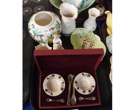 A boxed set containing two small ceramic dishes, two spoons stamped 925 and two horn spoons, all with enamel roundels, togeth