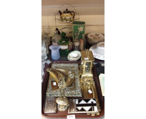 A silver plated Art Nouveau cigarette case, a Deco chrome note pad, assorted brassware, three chemists bottles, carriage cloc