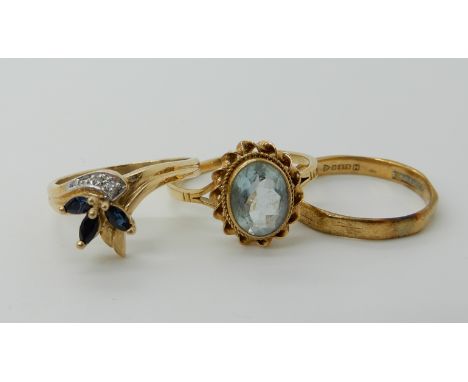 A 9ct sapphire and diamond accent ring size S1/2, a 9ct aquamarine ring size S1/2 and a 9ct wedding ring size R, combined wei