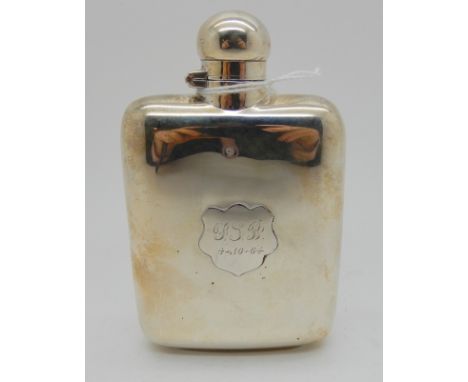 A silver spirit flask, Sheffield marks, of rectangular shape monogrammed "JLB" and dated 4-10-64, 9cm x 7cm, 106gms Condition