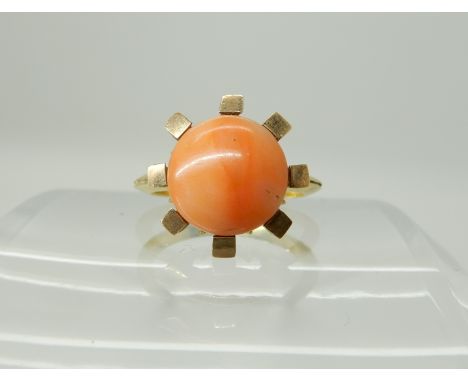 A bright yellow metal coral set ring, size K, weight 4.2gms Condition Report: Available upon request