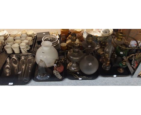 A collection of oil lamp bases, shades and funnels Condition Report: Available upon request