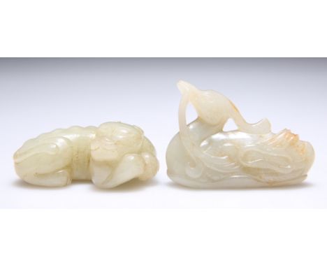 A JADE CARVING OF A PHOENIX WITH LINGZHI, 4cm by 6cm by 2cm; and A JADE CARVING OF A RECUMBENT&nbsp;TIGER, 2.5cm by 5.8cm by 
