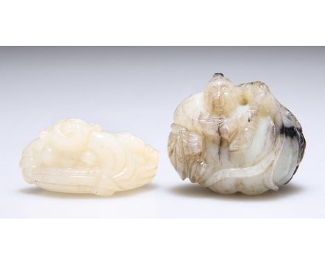 A JADE CARVING OF A BOY AND GOURDS, 3.5cm by 4cm; and A JADE CARVING OF A BOY ON TOP OF A BASKET, 2cm by 4cm by 3cm. (2)CONDI