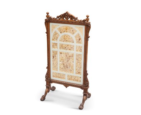 ATTRIBUTED TO GILLOWS, A VICTORIAN OAK COUNTRY HOUSE FIRESCREEN, with pierced and carved foliate crest and leaf-carved spandr