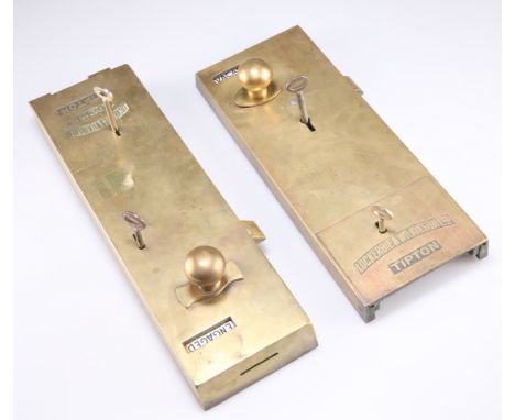TWO EARLY 20TH CENTURY BRASS PENNY SLOT TOILET LOCKS, by Lockerbie &amp; Wilkinson Ltd, Tipton. (2) 34cm by 10cm and 30.5cm b
