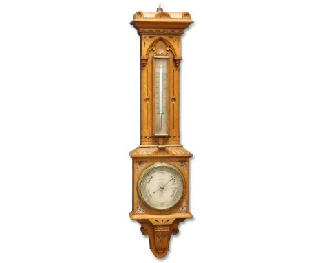 AN OAK CASED BAROMETER AND THERMOMETER, by Negretti and Zambra, London, 27911, the circular aneroid barometer and mercurial t