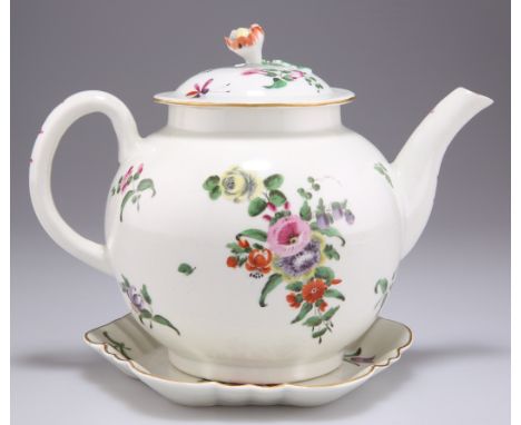 A WORCESTER PORCELAIN TEAPOT AND STAND, CIRCA 1770, of globular form with a flower head finial, painted with floral sprays an