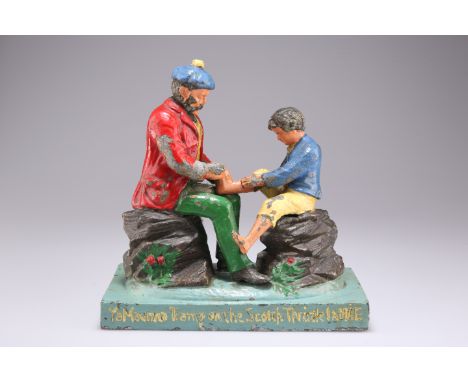 A SPELTER&nbsp;ISDALE &amp; McCALLUM'S SOAP WORKS ADVERTISEMENT CAST METAL FIGURE, modelled as a Scotsman and a boy seated up