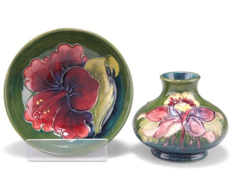 A WILLIAM MOORCROFT POTTERY VASE, squat form with a flared neck, 'Columbine' pattern, tubelined and hand-painted in tones of 