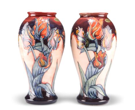A PAIR OF MOORCROFT LARGE POTTERY VASES, of baluster form, tubelined and hand-painted with Sally Tuffin's 'Red Tulip' pattern