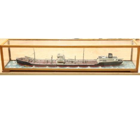 A CASED SHIP DIORAMA OF M/T FERNCASTLE, the model of the Norwegian merchant tanker on a naturalistic seascape within a glazed