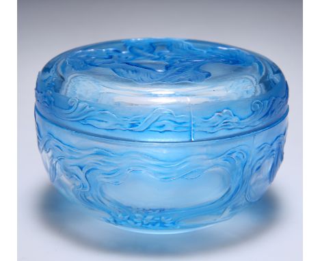 LALIQUE FOR COTY FRANCE, A ‘L’ORIGAN’ CIRCULAR POWDER BOX AND COVER, blue stained moulded glass, the interior moulded ‘Laliqu