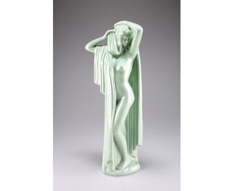AN ART DECO CELADON GLAZED FIGURE, modelled as a scantily clad maiden. 48cm highCONDITION REPORTOverall in good condition, no