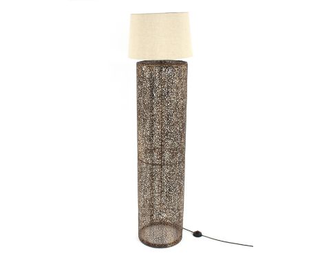 A modern design pierced metalware standard lamp and grey shade, 155cm high overall