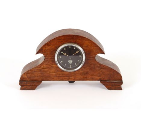 A Smith's Art Deco oak cased mantel clock, 30cm long x 17cm high