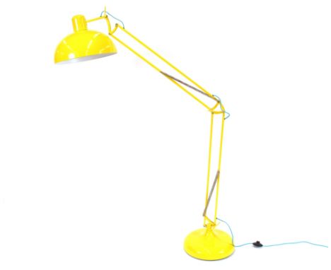 A yellow enamel finish retro design angle poise standard lamp