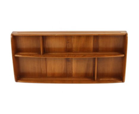 A light Ercol plate rack, 107cm wide x 53cm high