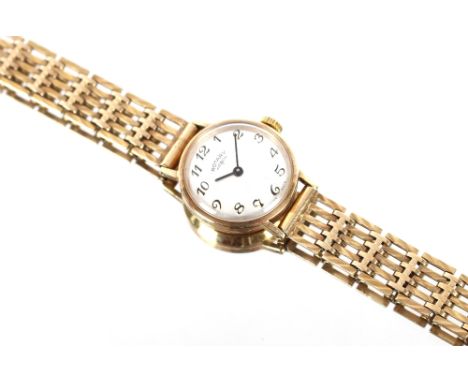 A ladies 9ct gold cased Rotary wrist watch, with 9ct gold strap and clasp, approx. weight 22gms