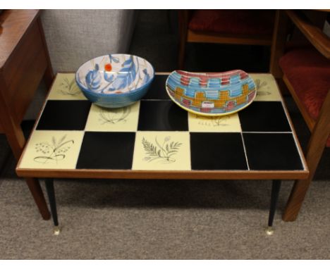 A 1960's tile top coffee table; and two vintage Italian ceramic bowls