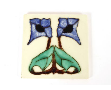 An Art Deco design tile, 15.3cm square