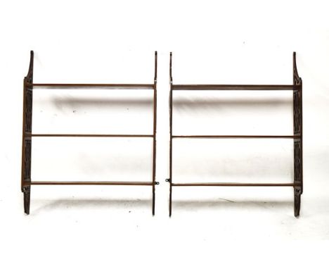 Pair of 20th Century mahogany open wall shelves, each of three shelf design between Chippendale style pierced ends   Conditio