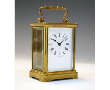 French brass cased carriage clock, the white enamel dial with Roman numerals   Condition: 