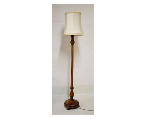 Early 20th Century beech standard lamp with reeded cylindrical column stem on spreading circular base and three feet   Condit