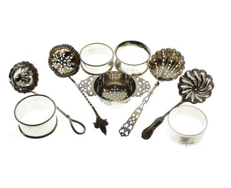 Various silver comprising: Edward VII tea strainer, Sheffield 1904, four various napkin rings and four sifting spoons, combin