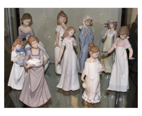 Collection of nine various Nao figures, 21cm - 29cm high   Condition: 