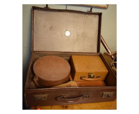 Pioneer suitcase containing other leather items to include; jewellery case, circular box, folio and leather backed brush   Co