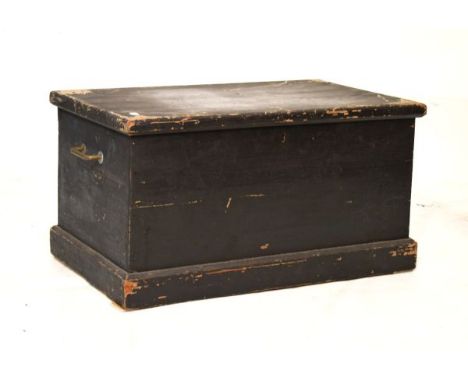 Black painted wooden trunk with brass carry handles   Condition: 