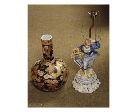 Oriental porcelain bottle vase with raised gilt dragon decoration, together with a Continental figural table lamp base   Cond