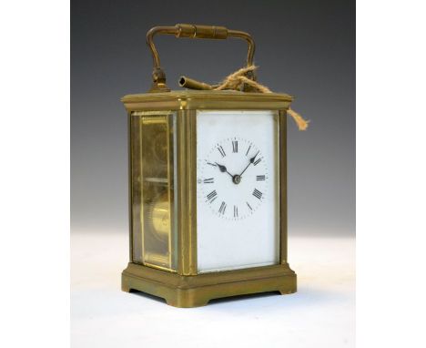 French brass cased carriage clock, the white enamel dial with Roman numerals   Condition: 