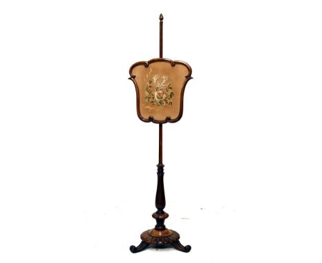 Victorian rosewood polescreen, the panel with needlepoint decoration depicting the head of a stag, turned pillar and circular