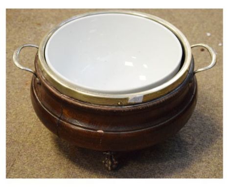 Early 20th Century oak two handled bowl with ceramic liner and silver plated rim on three claw and ball feet   Condition: 