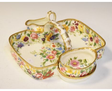 Hammersley dessert dish having a central loop handle terminating at the matching cream jug and sugar basin, allover floral de