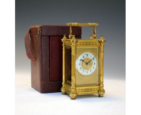 Late 19th/early 20th Century French brass cased carriage clock, the case with fluted pillars to each corner, off-white enamel