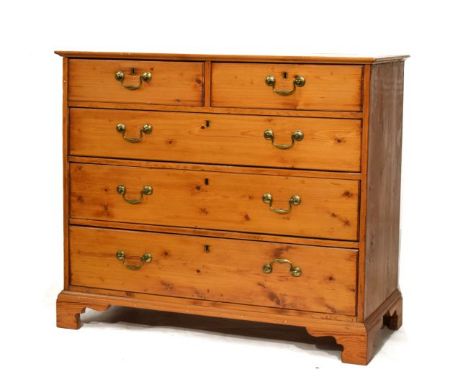 Yellow pine chest of two short over three long drawers on bracket feet   Condition: 