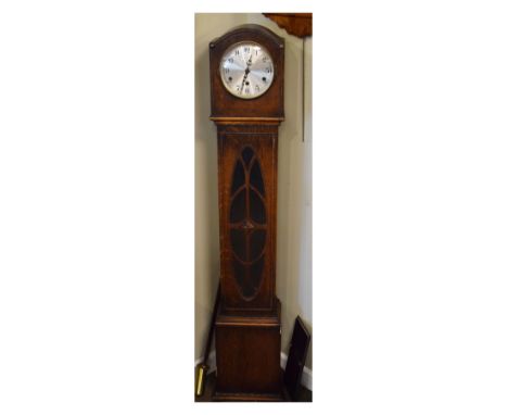1920's period oak cased chiming grandmother clock with silvered Arabic dial and three train movement over beaded case with ov
