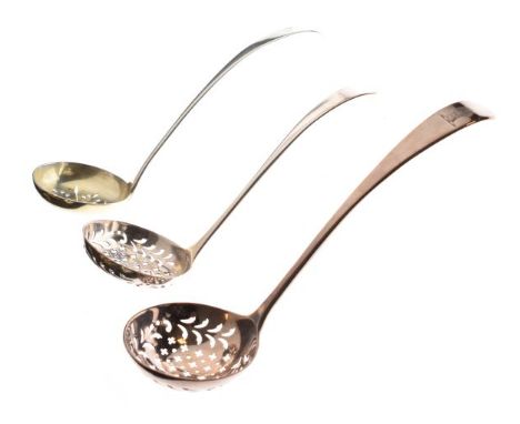 Two George III silver sifting ladles, together with a similar George IV ladle, London 1792, 1811 and 1828, combined weight 3.