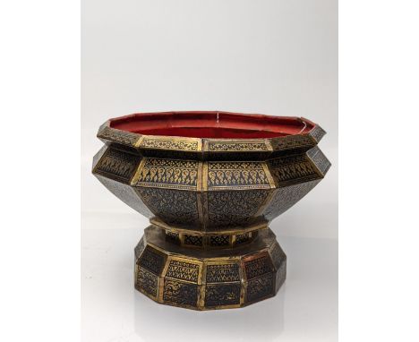 An early 20th century Thai  lacquered and gilded metal 12-sided betel nut stand, D.24cm