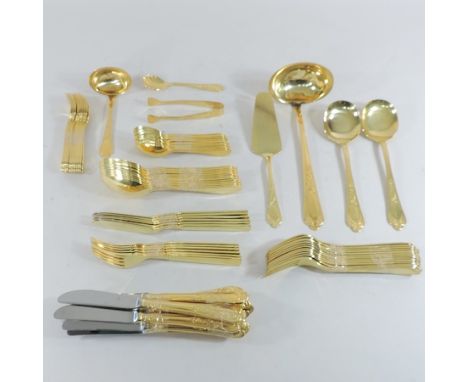 A collection of German gold plated cutlery, to include twelve place settings and a ladle