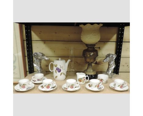 A pair of aluminium greyhound heads, a brass oil lamp and Worcester Evesham part coffee service