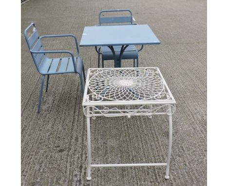 A blue painted metal garden table, 70 x 70cm, with two matching chairs, together with a white painted metal openwork garden t