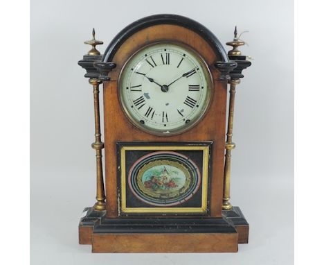 A 19th century American mantel clock, with an eight day movement, 43cm tall