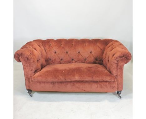 A Victorian red upholstered button back Chesterfield sofa, 153cm 