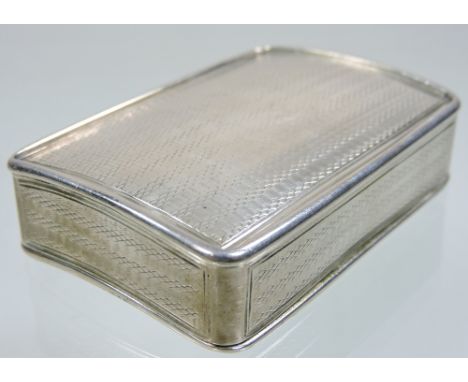 A George IV silver snuff box, of concave rectangular shape, with a hinged lid and engine turned decoration, by Joseph Willmor
